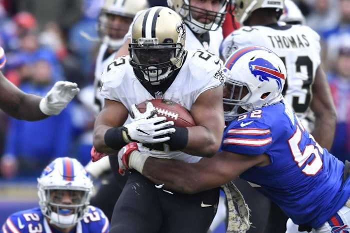 New Orleans Saints running back Mark Ingram (22) runs through Buffalo Bills defenders. Mandatory Credit: Mark Konezny-USA TODAY Sports